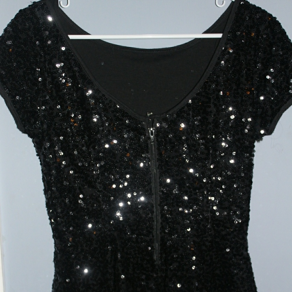 Peplum Sequin Top